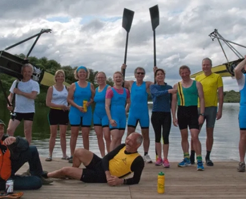 Group of happy Rojabo sculling camp campers